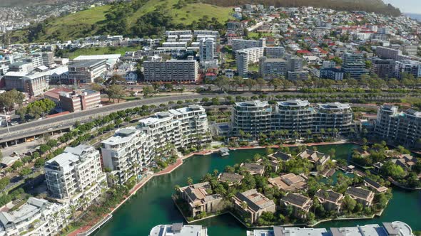 Aerial view looking down at the concrete island and buildings surrounding it