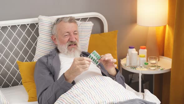 Elderly Man Refuses to Drink Pills Advanced Age