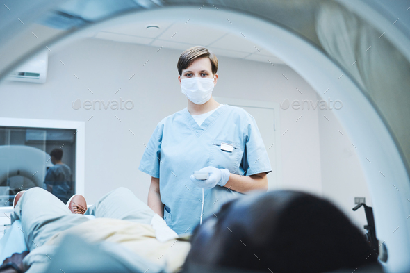 Radiologist providing diagnostic imaging of patient