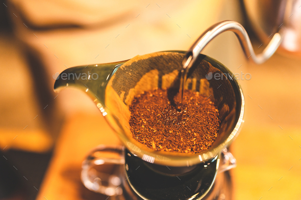 Hipster Barista Making Hand Drip Coffee Stock Photo - Download