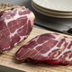 Piece of traditional Croatian dried pork neck, pork collar bacon, and slices - PhotoDune Item for Sale