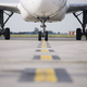 Front view of airplane at airport - PhotoDune Item for Sale