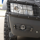Headlight of the truck under the protective grill - PhotoDune Item for Sale