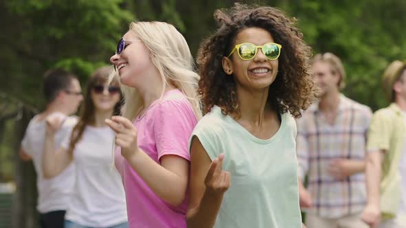 Two Female Singers Dancing With Backup Dancers for Music Clip, Popular Pop Band alt