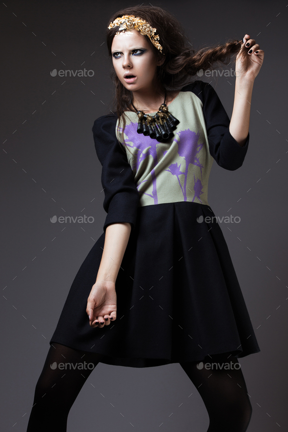 Beautiful Fashionable Girls In A Stylish Dress, Showing Different Poses.  Beauty, Style, Fashion. Picture Taken In The Studio Stock Photo, Picture  and Royalty Free Image. Image 48292749.