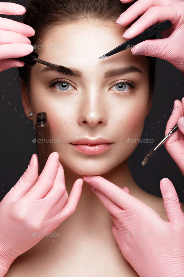 Beautiful Young Girl With Natural Nude Make Up With Cosmetic Tools In Hands Beauty Face Stock 9040
