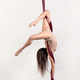 Female gymnast doing falling trick on aerial silk - PhotoDune Item for Sale
