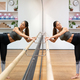Gracious young ethnic ballerina exercising in studio - PhotoDune Item for Sale