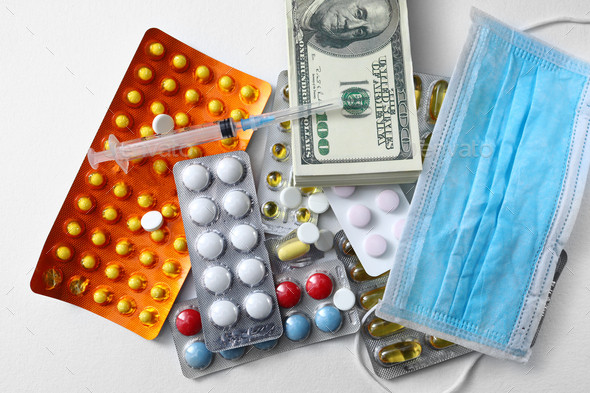 medicine mask, money, dollars banknote, red pills and syringe on white background, medical expense