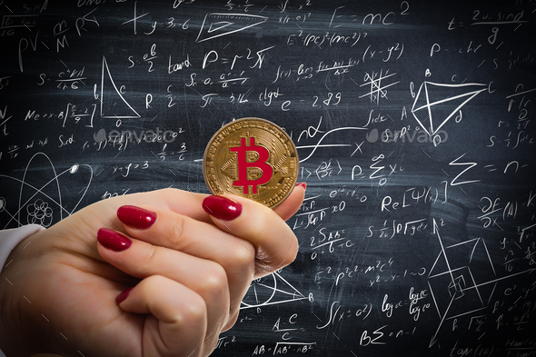 bitcoin on the background of formulas - Stock Photo - Images