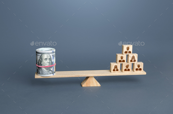Money dollars and people on scales. Concept of wages for employees and workers. - Stock Photo - Images