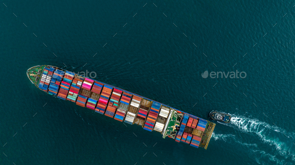 Aerial top view of cargo ship carrying container and running for export goods from cargo