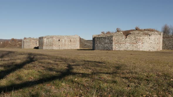 GAMZIGRAD, SERBIA - DECEMBER 25, 2017 Stone towers   under blue sky in Felix Romuliana palace comple alt