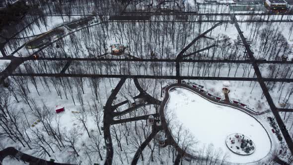 Frozen winter lake in city park, aerial Kharkiv