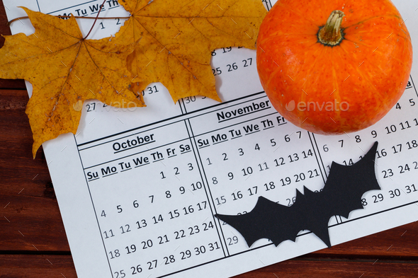 Halloween is coming soon, october calendar and pumpkin.