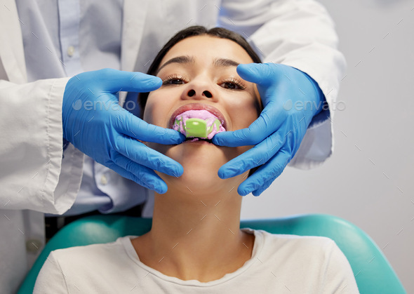 First impressions count. Shot of a young woman having dental work done on her teeth.