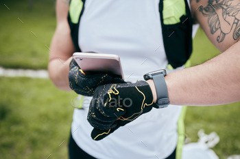 Cropped shot of an unrecognizable young male athlete checking the time during his morning run