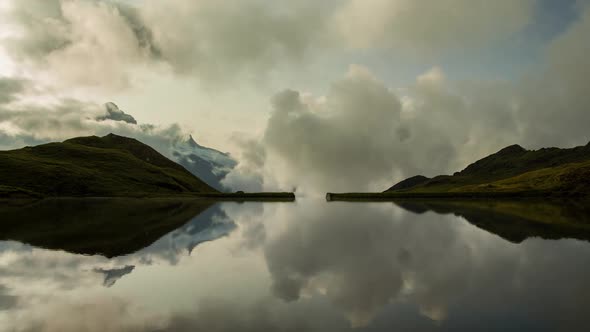 Time Lapse Clouds Reflecting in Lake Bachalpsee Swiss Alps