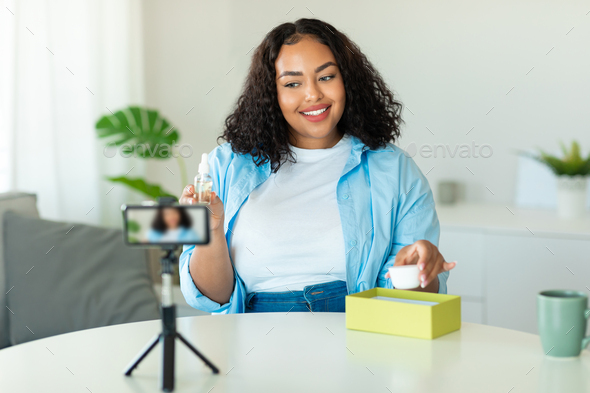 African American Woman Blogger Lady Making Video Via Smartphone Indoors - Stock Photo - Images