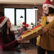 Diverse women exchanging present box on christmas eve - PhotoDune Item for Sale