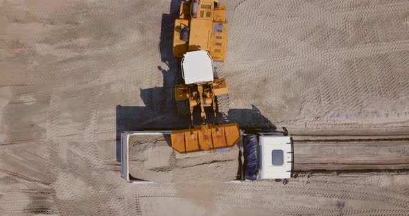 The Work of Loading Equipment in the Sand Quarry