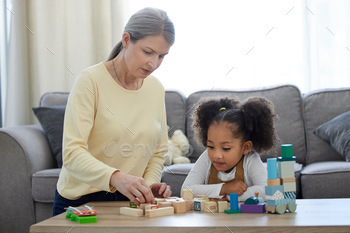 Shot of a mature child psychologist with her patient