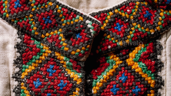 Handmade embroidery on Ukrainian shirt. Geometric ornaments, traditional clothes of Ukrainians