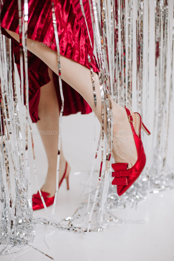 bright red shoes woman christmas party fashion - Stock Photo - Images