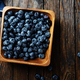 Freshly picked blueberries in wooden bowl.  - PhotoDune Item for Sale