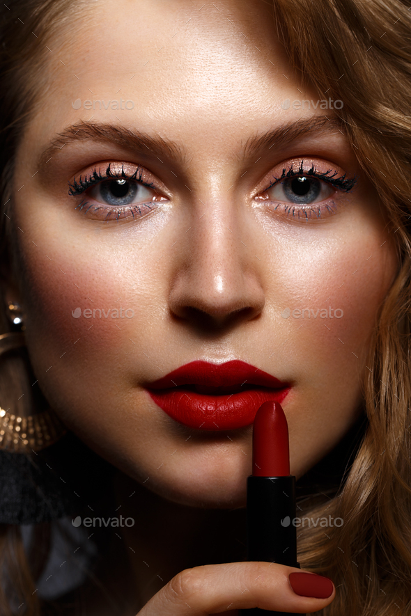 Girl With Red Lips And Classic Makeup