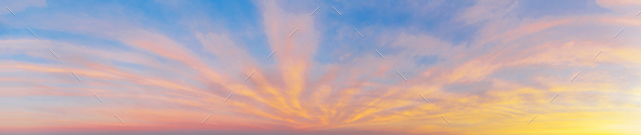 Panorama of the evening sky with orange clouds - Stock Photo - Images