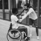 Multiethnic friends with disability greeting each other at park city - PhotoDune Item for Sale
