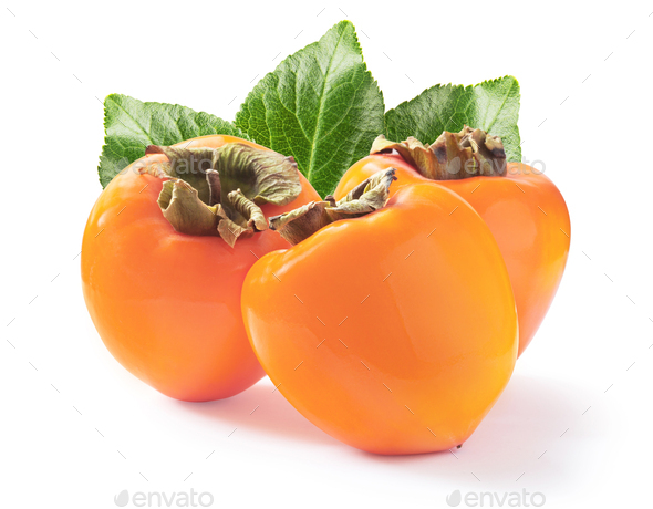 Three ripe juicy persimmons with green leaves isolated on white background - Stock Photo - Images