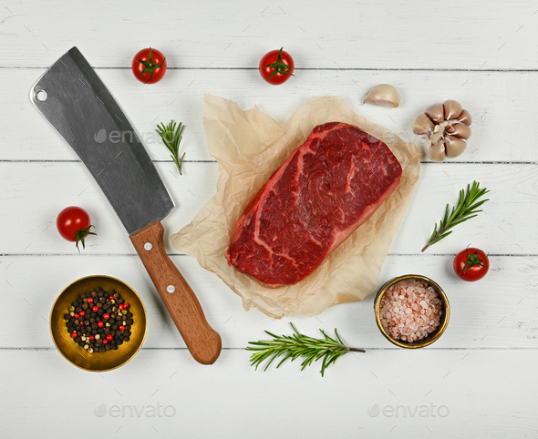 Close up raw beef sirloin steak on paper