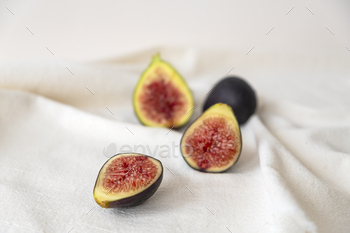Figs on beige color table cloth.