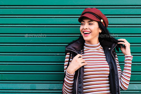 young moroccan girl with short hair with fall outfit - fall concept