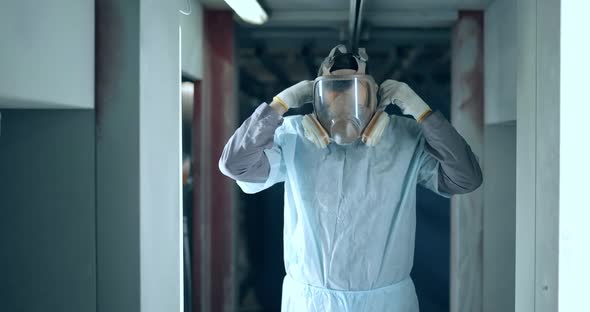 Painter Taking Off His Protective Mask alt