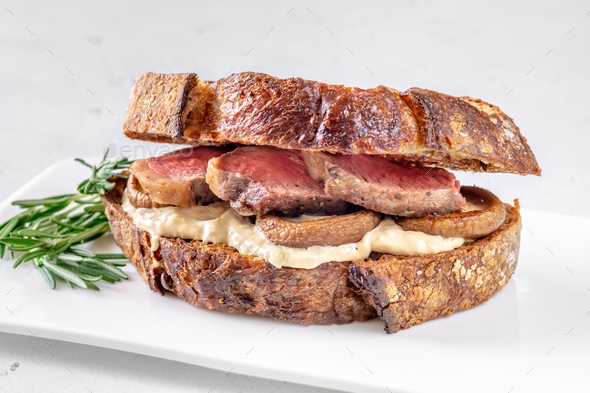 Sandwich with beef steak and mushrooms - Stock Photo - Images