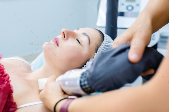 LPG massage apparatus process. Lymphatic drainage massage for woman in beauty salon. selective