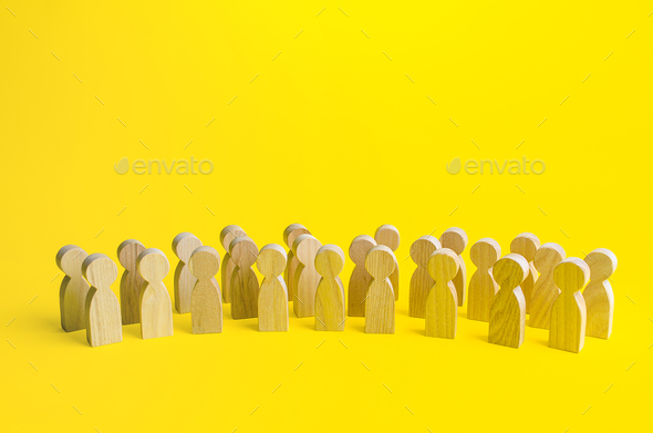 A large group of figurines of people on a yellow background.