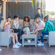 Multiethnic friends on a terrace having a good time - PhotoDune Item for Sale
