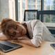 Tired female entrepreneur dozing off at work - PhotoDune Item for Sale