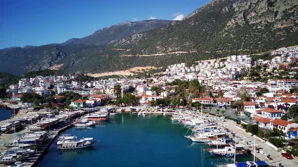 The top view from the drone of Kas resorts, bay, yahts, city in Mugla in Turkey alt