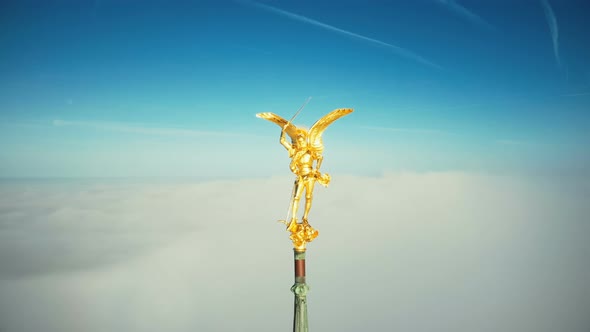 Amazing Aerial Close-up Shot of Golden St Michael Angel Statue on Top of Famous Mont Saint Michel alt