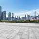 empty square floor with modern city background - PhotoDune Item for Sale