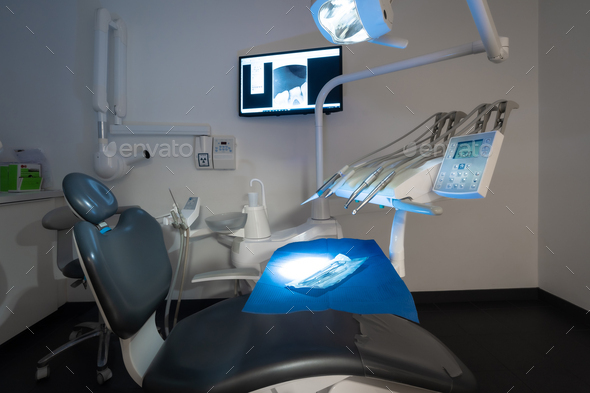 Modern dental practice. Dental chair, medical light, dental clinic without people