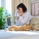 Woman sneezing allergic to domestic cat fur - PhotoDune Item for Sale