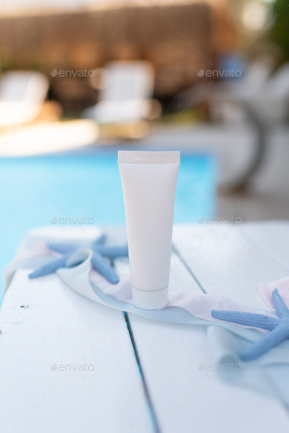 mockup of a tube for cream, packaging on a white background, sunscreen mocap, cream on a marine them