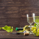 wine glass and bunch of grapes on wooden table - PhotoDune Item for Sale