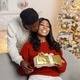 Young black man make a surprise for his girlfriend in Christmas eve - PhotoDune Item for Sale